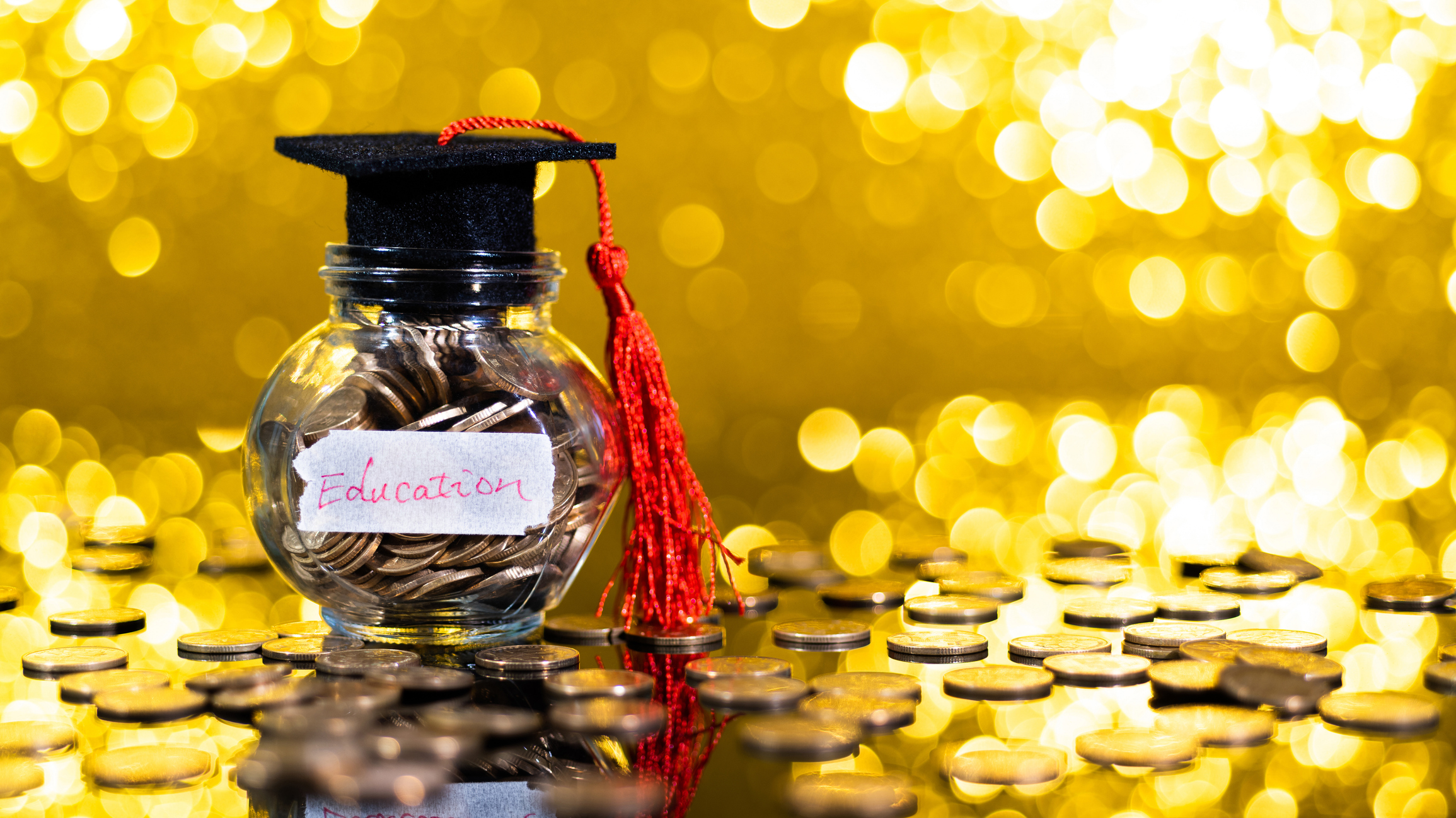 Coin jar with education label